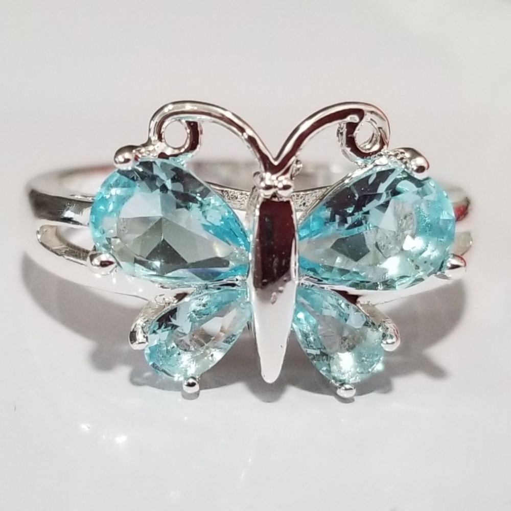 925 stamped plated silver light topaz blue butterfly ring size 7